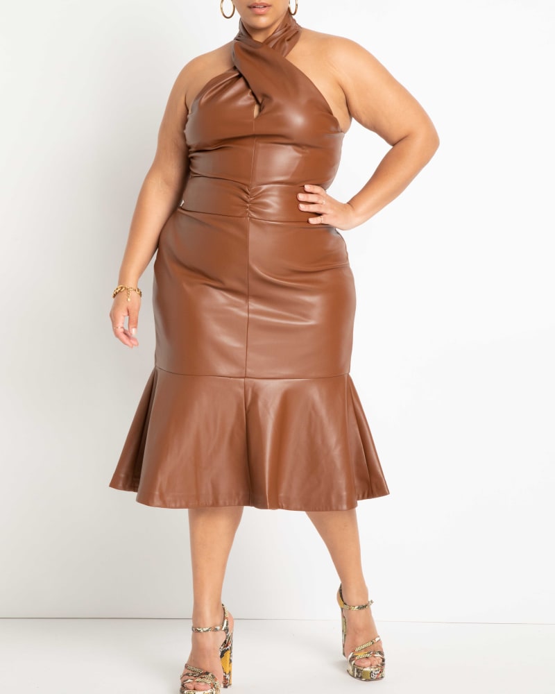 Front of a model wearing a size 14 Trumpet Faux Leather Midi Skirt in Sorrel Horse by ELOQUII. | dia_product_style_image_id:236509